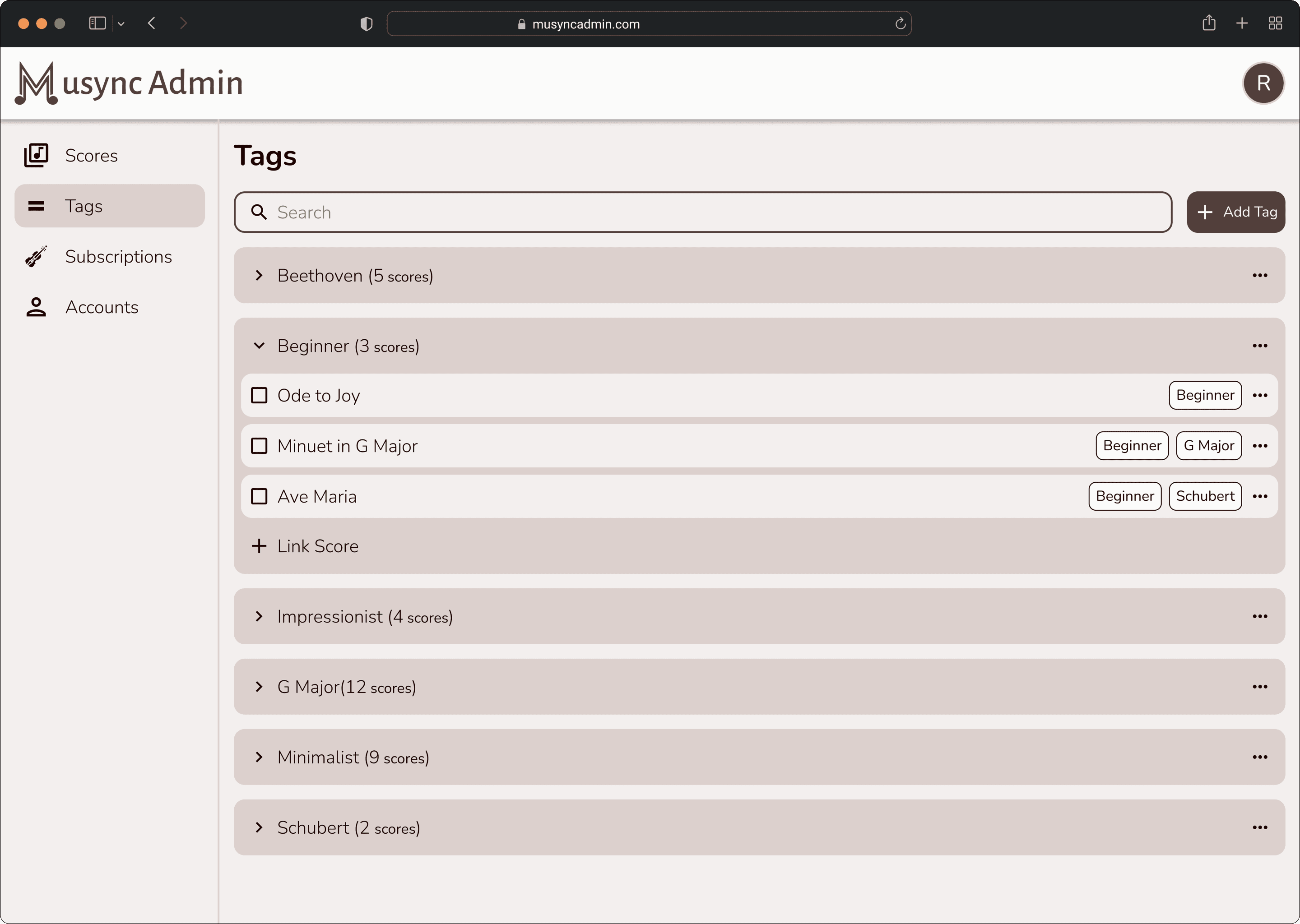 Tags page with a search bar, an Add Tag button, and collapsible tag groups showing score counts. The Beginner tag is expanded to list Ode to Joy, Minuet in G Major, and Ave Maria, with a Link Score button.